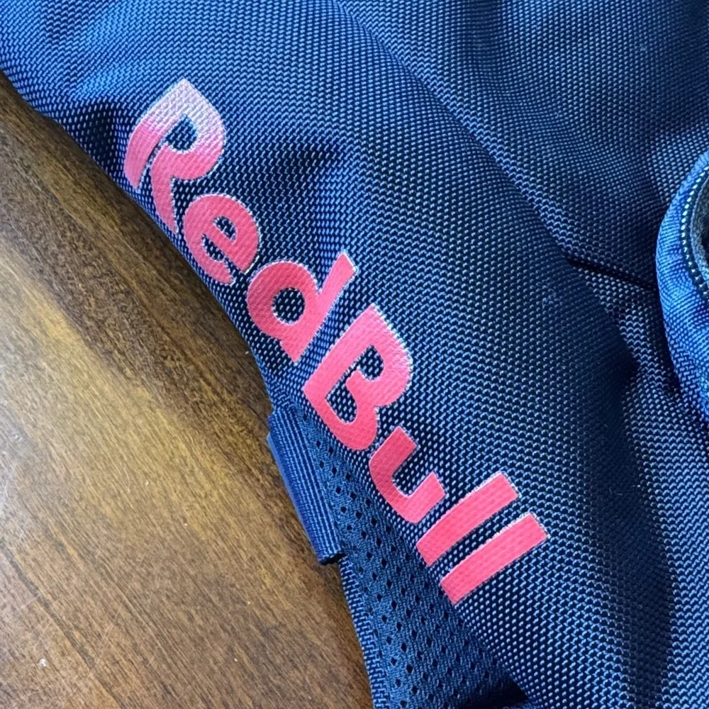 Oracle Red Bull Racing Formula F1 Roll Top Backpack with 3 Removable Patches